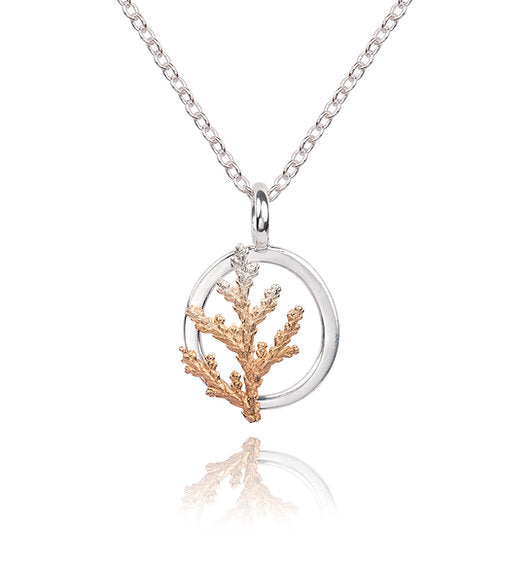 Forest Gold Medium Pendant - A silver forest leaf graduating to 18ct Plated Rose Gold and framed with a simple ring