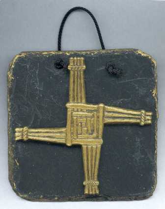 The St. Brigid's Cross Wall Plaque - cold cast in brass and then mounted onto a slate plaque 125mm x 125mm in size - st. brigid's cross