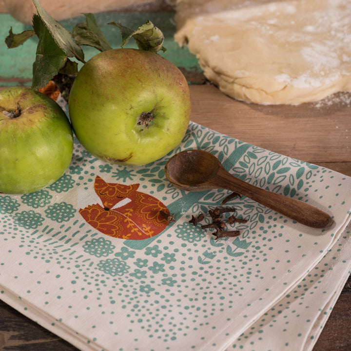 cream tea towel - red fox pattern - duck egg background