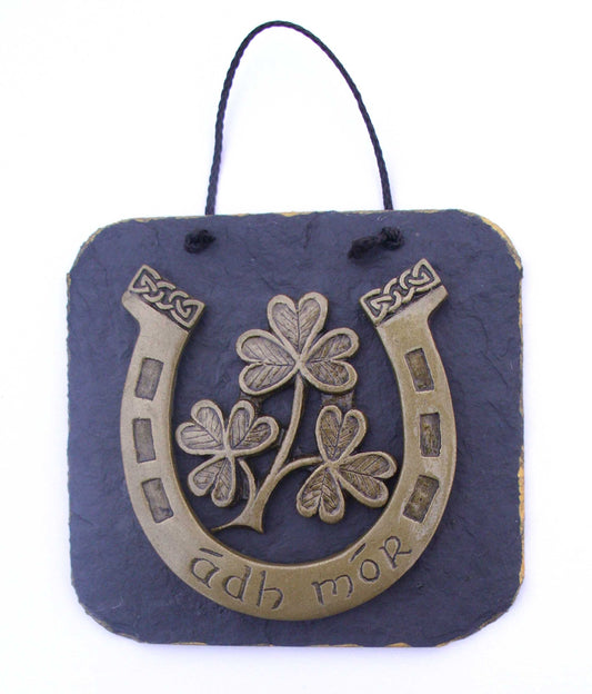 The Ádh Mór Irish Horseshoe Wall Plaque-Ádh mór is gaelic or Irish for good luck.-The ádh mór  Irish horesshoe with shamrock motif  is cold cast in Brass then carefully mounted onto a slate wall hanging plaque 125mm x 25mm in size.