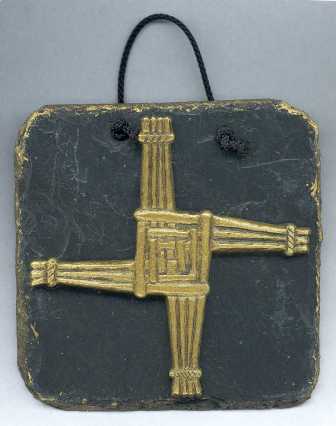 The St. Brigid's Cross Wall Plaque - cold cast in brass and then mounted onto a slate plaque 125mm x 125mm in size - st. brigid's cross 